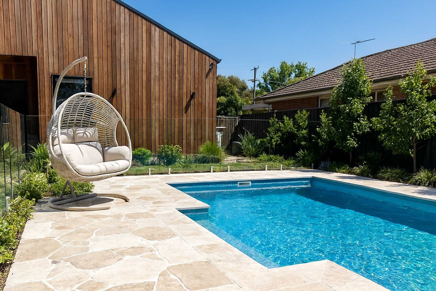 Classic Travertine Swimming Pool with Hammock Chair